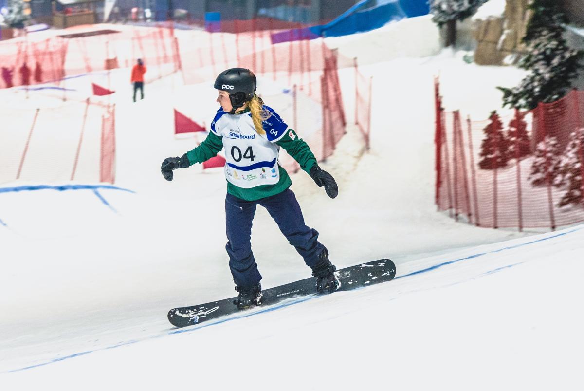 Woman snowboarding