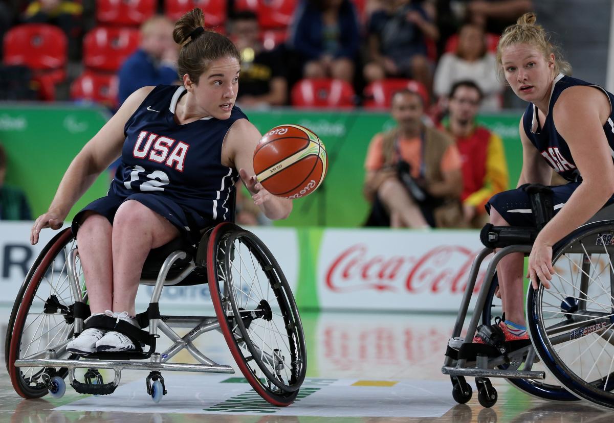 Rebecca Murray - US women's wheelchair basketball female wheelchair basketballer Rebecca Murray dribbles the ball on court