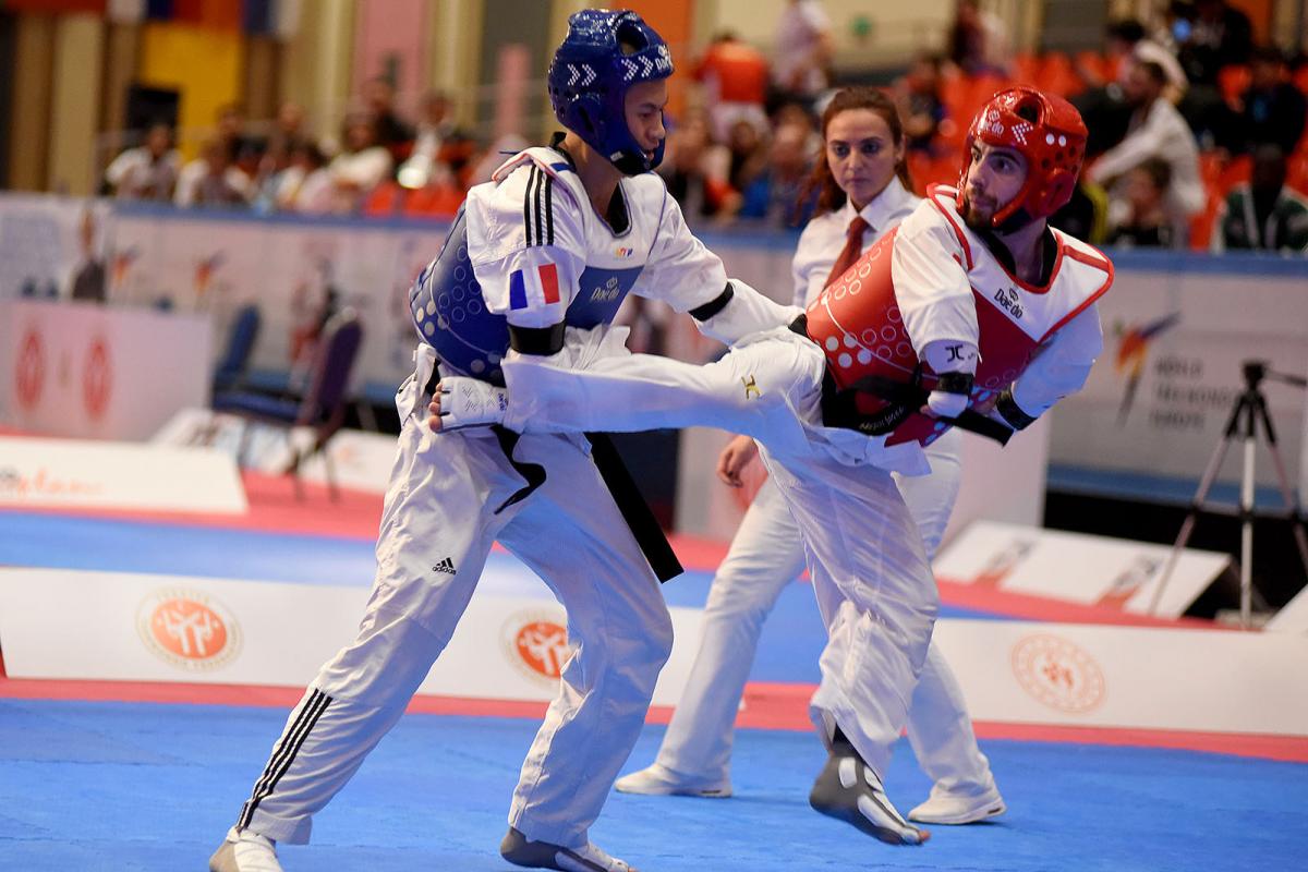 male Para taekwondo fighter Anthony Cappello kicks another fighter in the groin