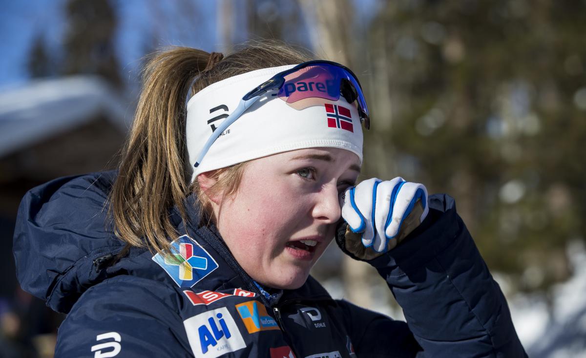 female Para Nordic skier Vilde Nilsen wipes away a tear