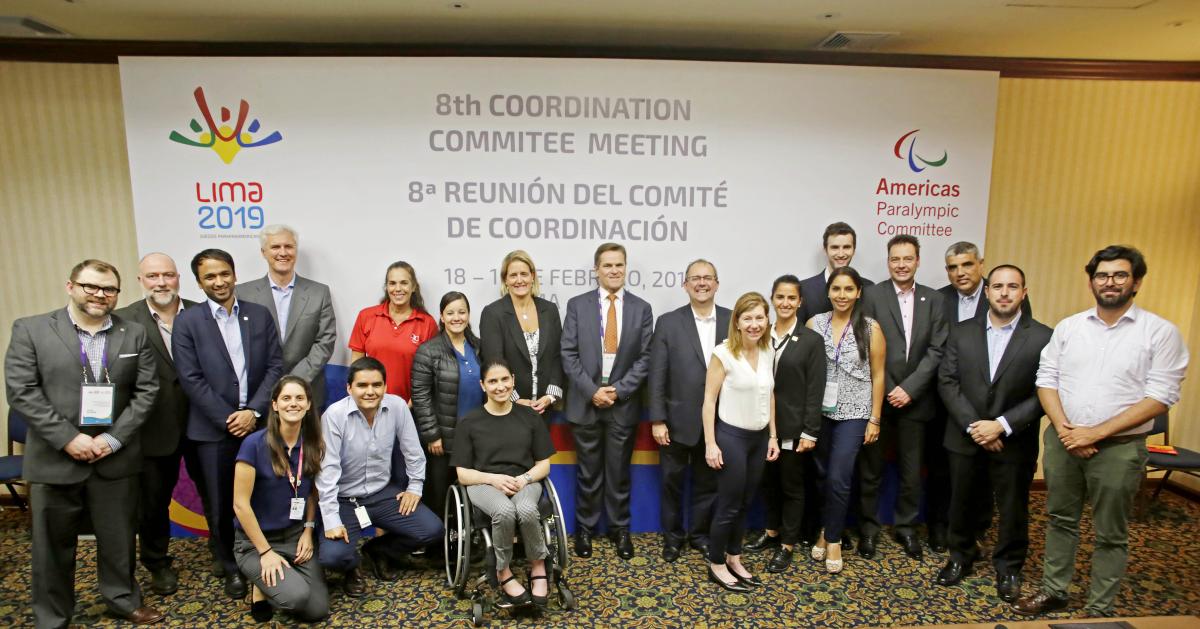 Lima 2019 CoCom a group of people in suits smiling