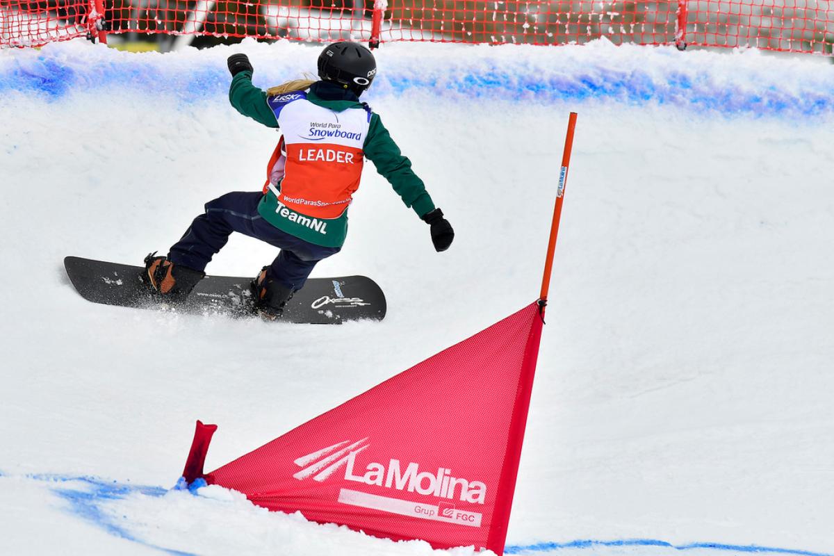 female Para snowboarder Lisa Buschoten on the slope