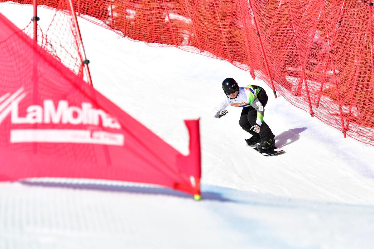 A man snowboarding