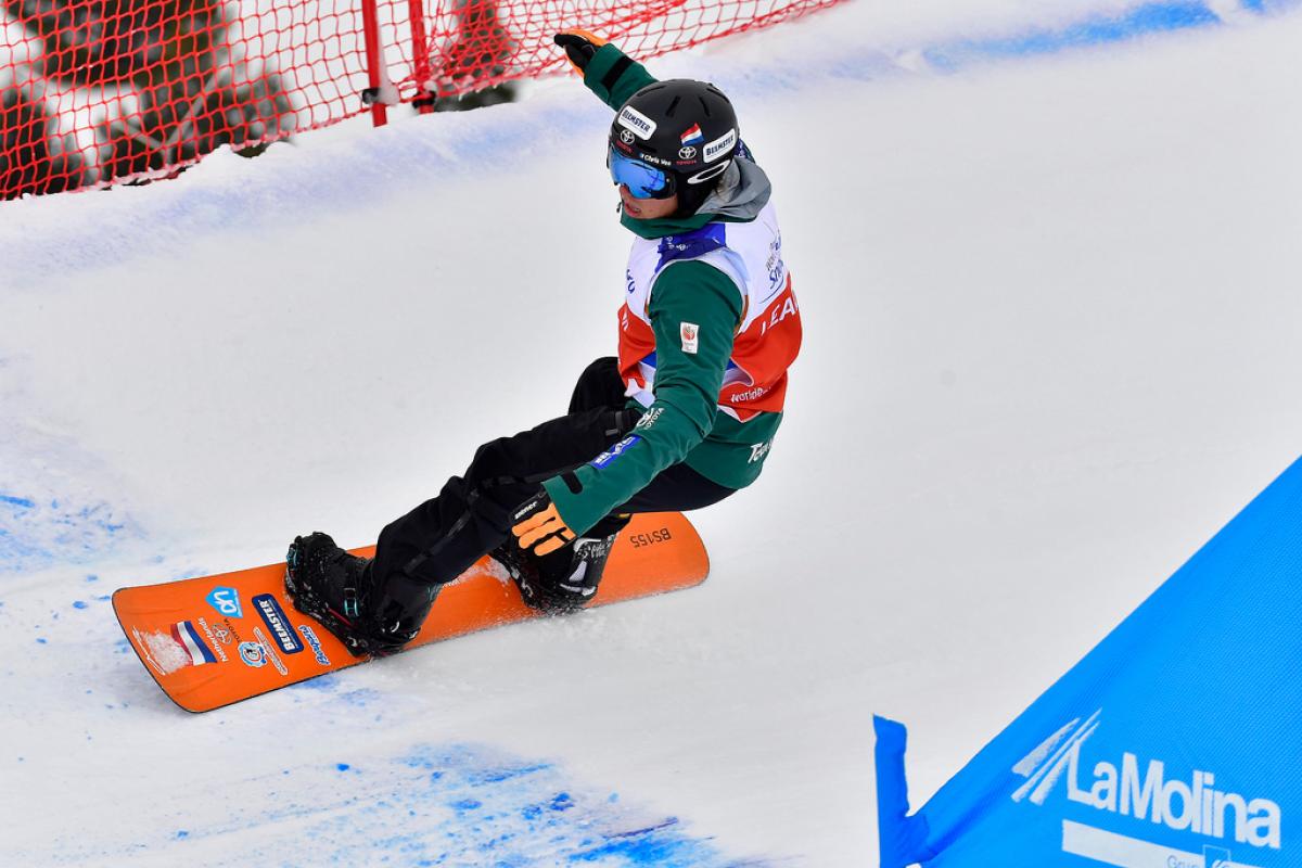 Chris Vos - La Molina 2019 male Para snowboarder Chris Vos goes round a banked slalom bend