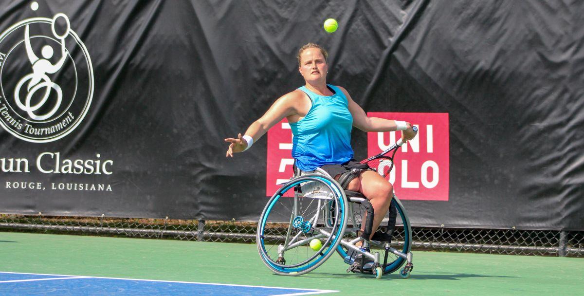 Aniek van Koot female wheelchair tennis player Aniek van Koot plays a backhand on a hard court