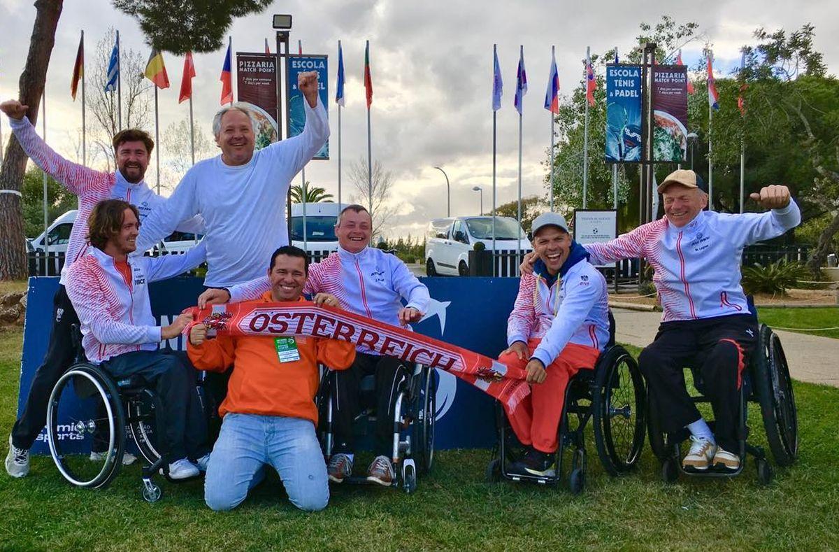 Austria - World Team Cup Euro Qualification male wheelchair tennis players from Austria holding up Austrian scarves and flags