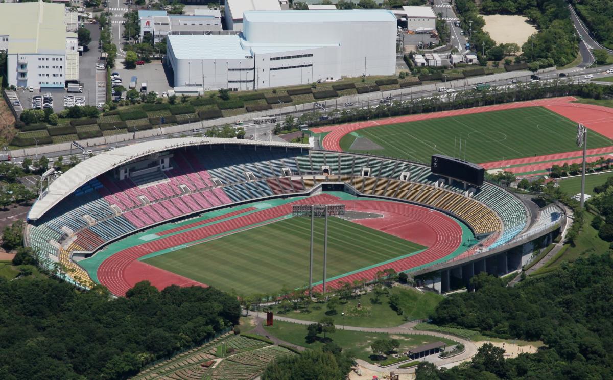 An aerial view of a stadium with an athletics track