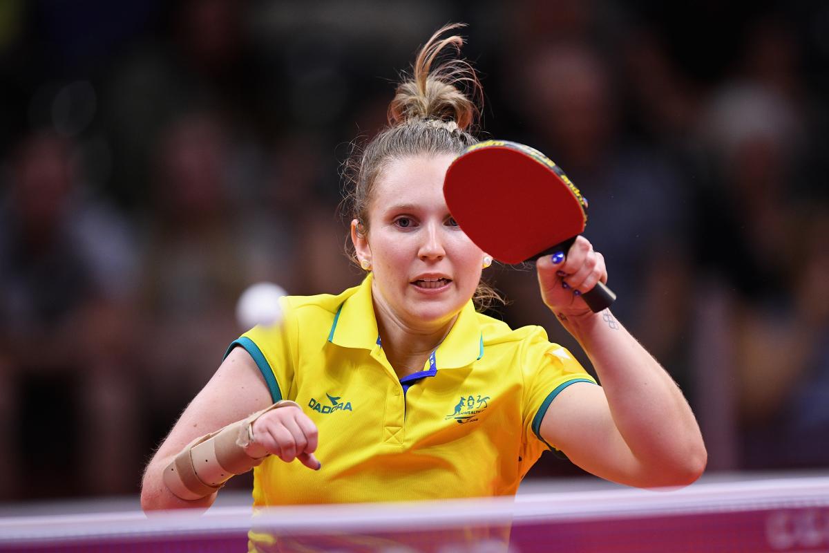 female Para table tennis player Melissa Tapper plays a forehand