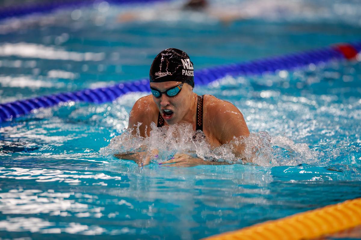 A woman swimming breaststroke 