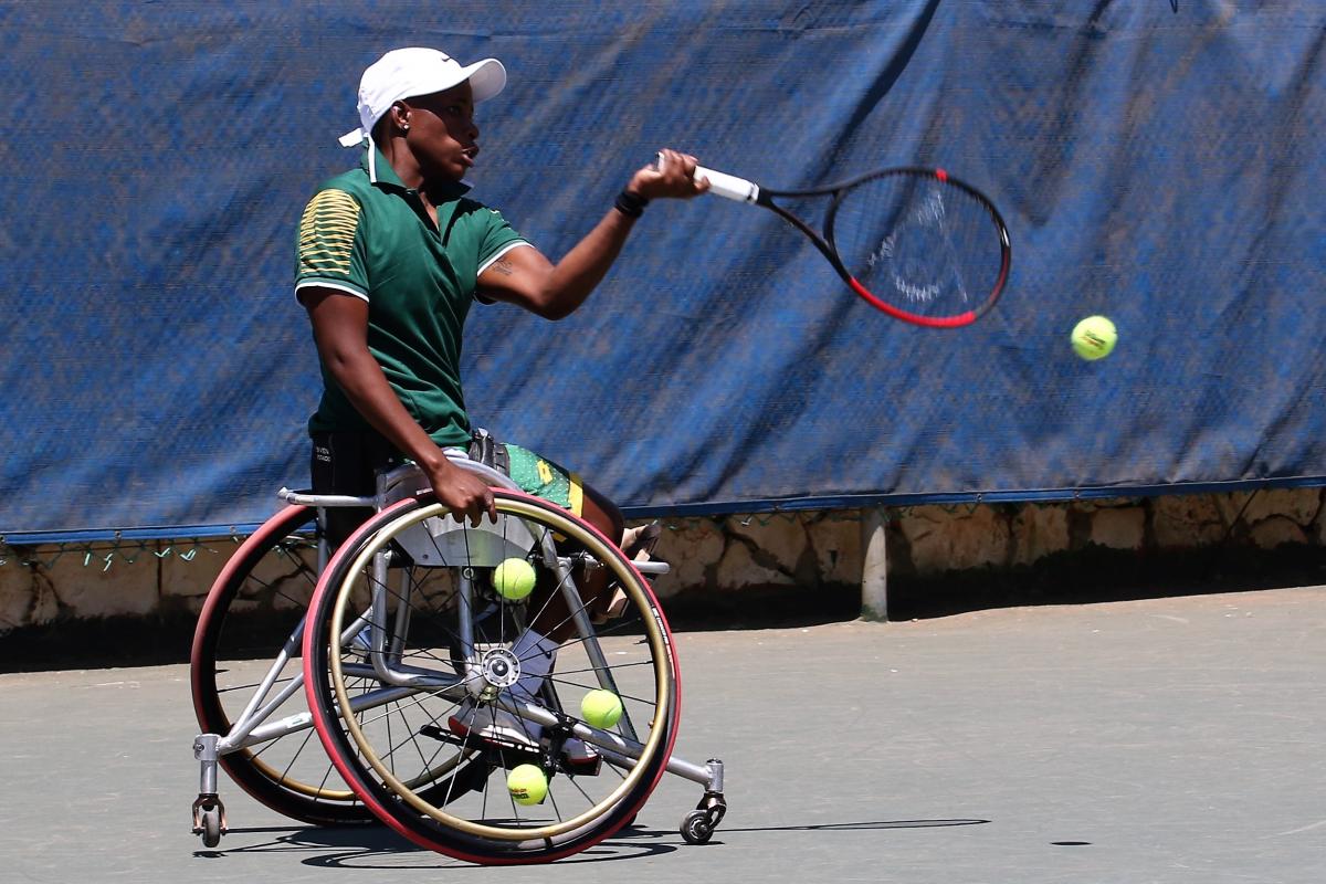 South African wheelchair tennis player Kgothatso Montjane ready to hit a backhand 