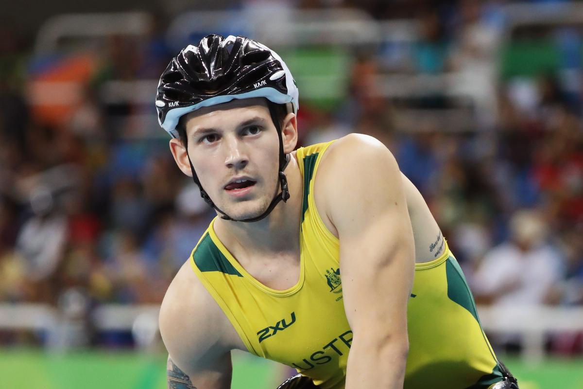 Rheed McCracken - Australia - athletics Rheed McCracken looks to the front after a race while wearing his Australian gear and helmet after the race