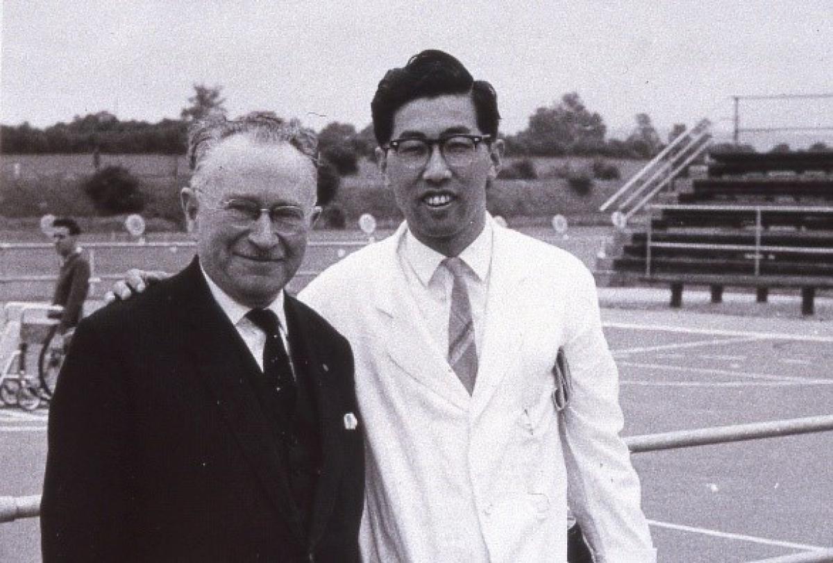 Yutaka Nakamura and Sir Ludwig Guttmann Black and white photo of Japanese man posing with Sir Ludwig Guttman