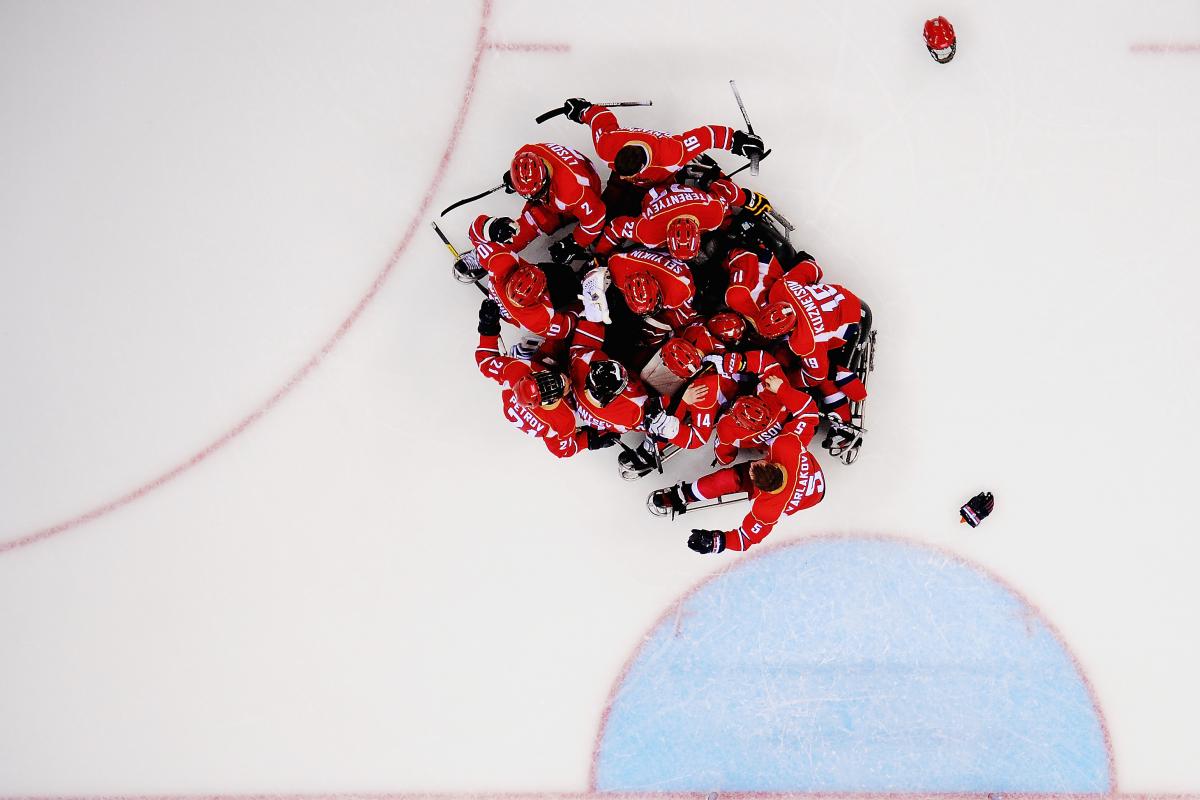 Russia's Para ice hockey players celebrating on ice