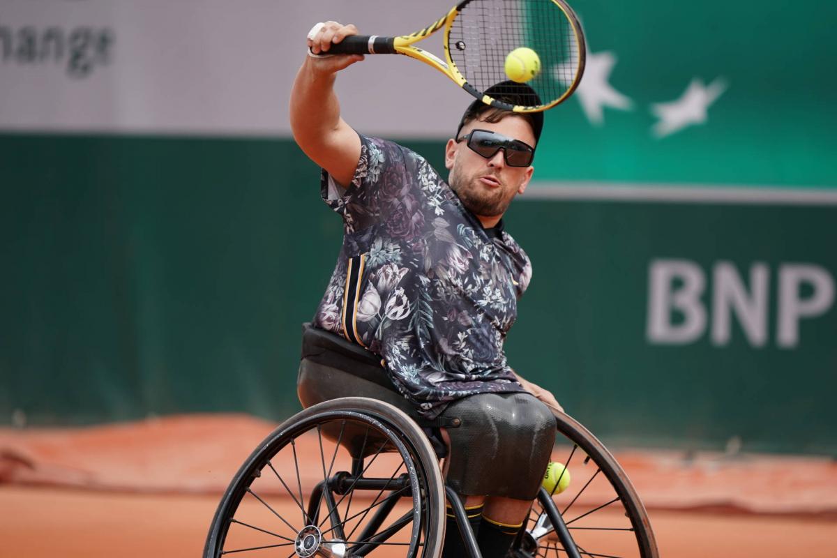 Dylan Alcott - Roland Garros 2019 male wheelchair tennis player Dylan Alcott hits a backhand on a clay court