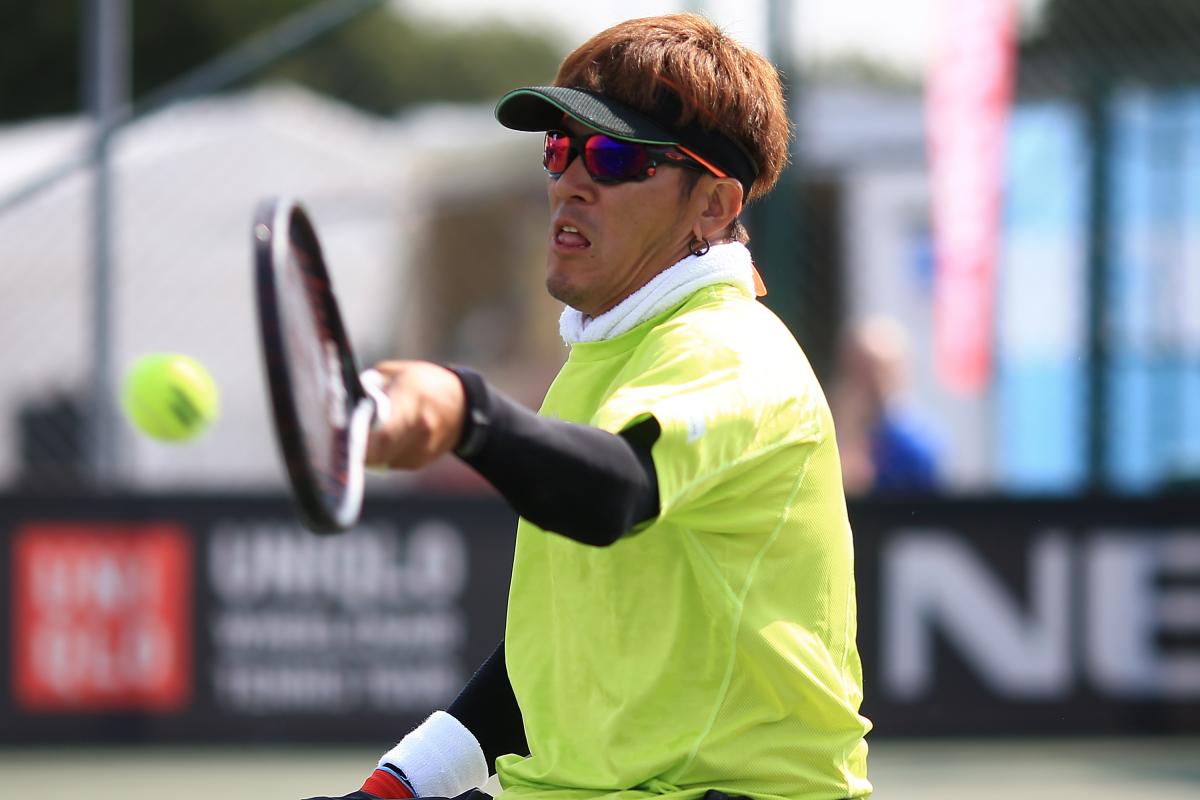 Koji Sugeno hits a forehand