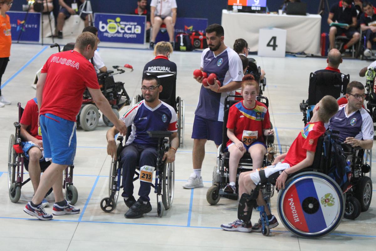 Russian boccia players with their coach