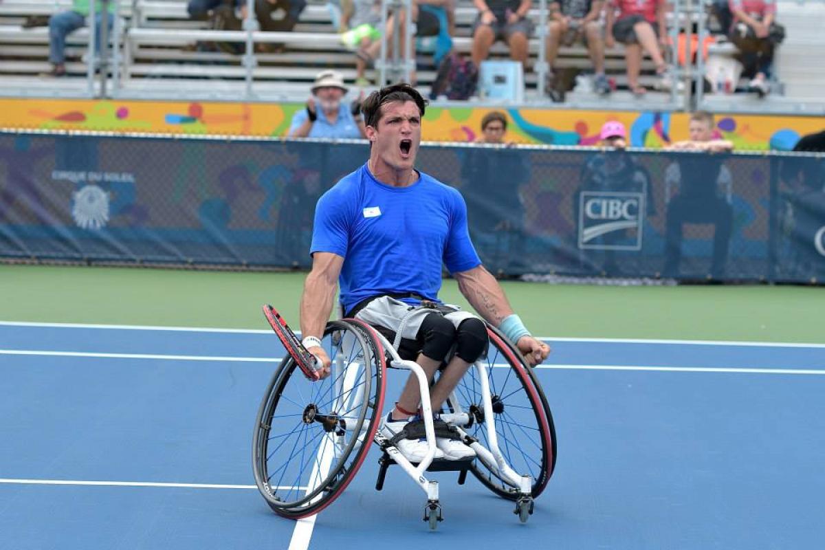 Gustavo Fernandez - Toronto 2015 - wheelchair tennis - Argentina Argentinian wheelchair tennis player Gustavo Fernandez screams with joy on the court after winning gold at Toronto 2015