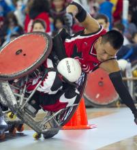 Team Canada Wheelchair Rugby action shot of player hitting the ground