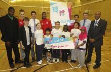 Children from a London school receiving a grant