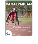 Cover photo of the magazine Paralympian showing athlete in a wheelchair with the text: Development, growing the paralympic movement.
