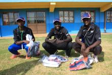 Three Kenyans opening welcome packs