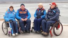 Oksana Slesarenko (third from left to right) with Team Russia Wheelchair Curling