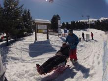 man on tandem sit ski