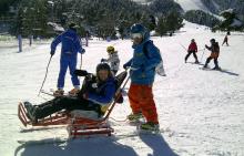 Natalia used a tandem sit-ski to get some great motion shots at the Winter Youth Camp