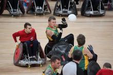 Wheelchair rugby players in action