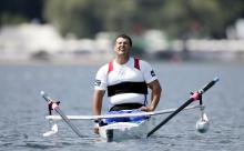 A picture of man in a boat affected by his effort