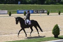 A picture of a woman riding