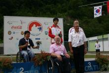 Medal winners with Sir Philip Craven at the 2010 IPC Shooting World Championships