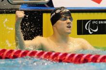 Great Britain's Ollie Hynd pumps his fist in the air after a top swim.