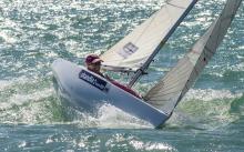 A picture of a woman in a small boat