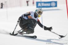 A picture of a woman skiing on the slopes