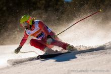 A picture of a man skiing on the slopes