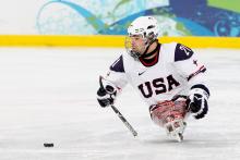 A picture of the ice sledge hockey player on ice