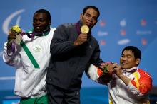 A picture of a man with a medal around his neck