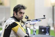 A picture of a man posing during the shooting competition