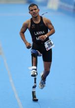 A picture of a man with a prosthesis running