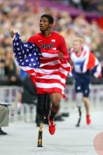 USA's Richard Browne celebrating his 100m T44 silver medal in London