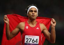 Mohamed Farhat Chida of Tunisia wins gold in the Men's 400m - T38 Final at the London 2012 Paralympic Games 