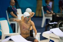 Man with swim cap prepares for the start