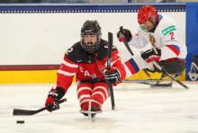 Canada's Greg Westlake scoots down the puck with the ice at the HARBORCENTER.