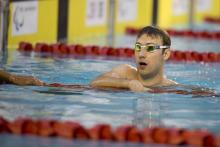 Picture of a swimmer in the pool after a race.