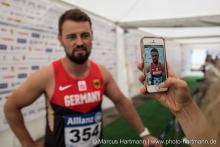 Man being filmed by a smartphone